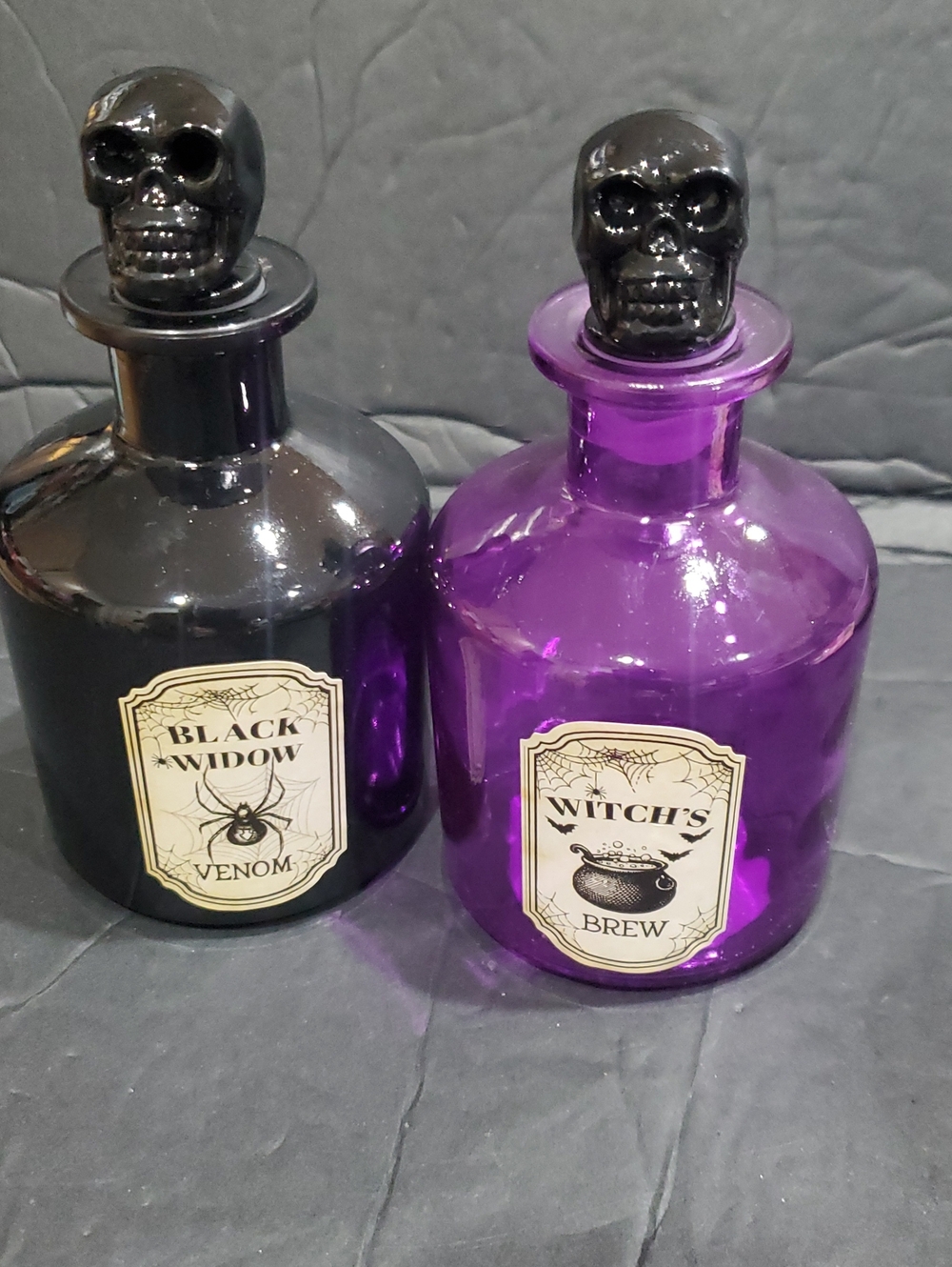2pack Black skull topped Black widow venom and Witches brew glass jars brand new